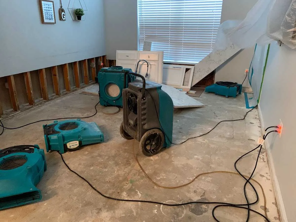 Dehumidifier in flood-cut room for Water Damage Restoration in The Woodlands